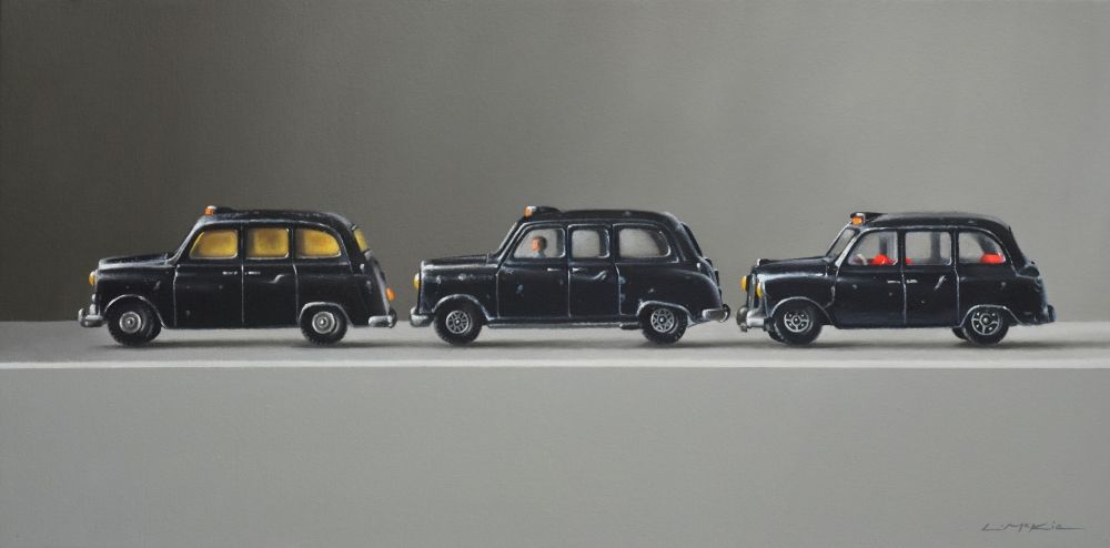Three Toy Taxis